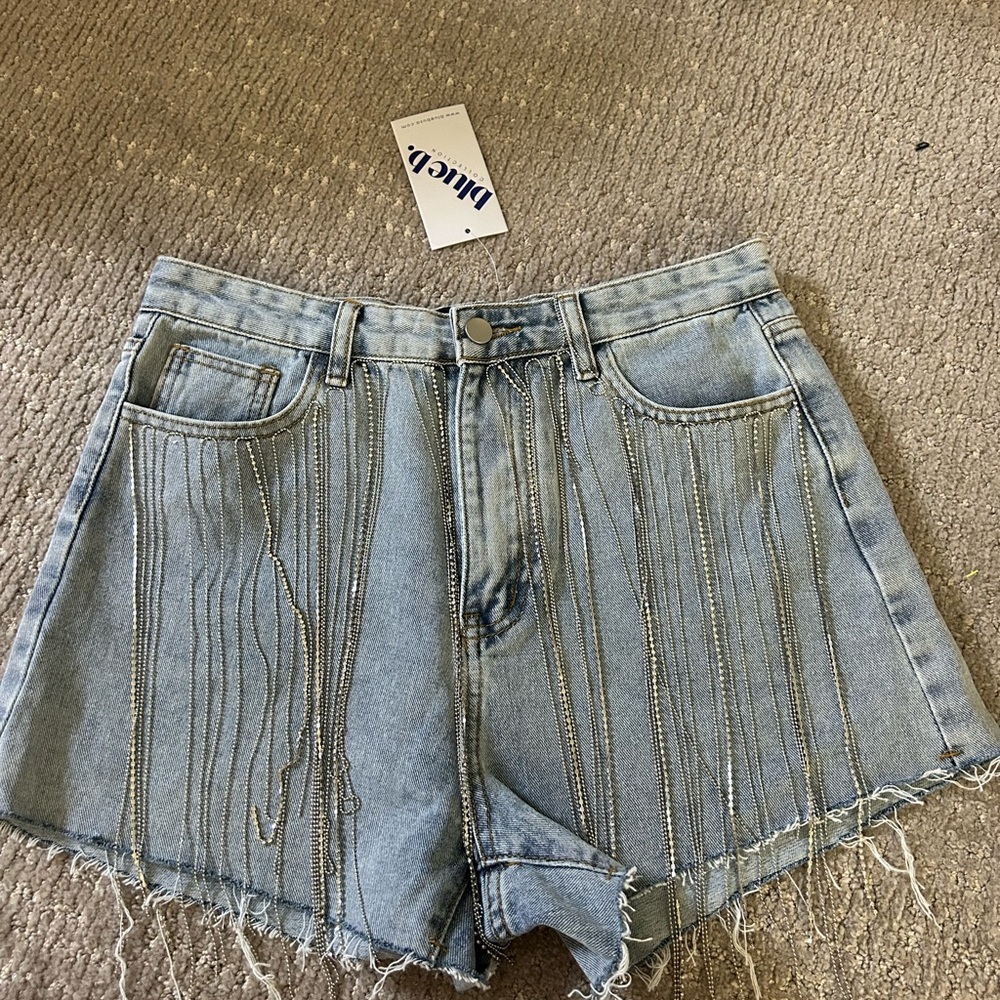 Denim, rhinestone shorts. From boutique in Nashville. New with tags. Size M